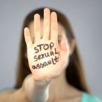Stop,Sexual,Assault,Sign,On,Womans,Hand,,Female,Rights,Protection,